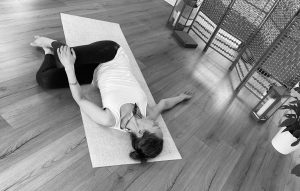 Woman practising yin yoga for menopause